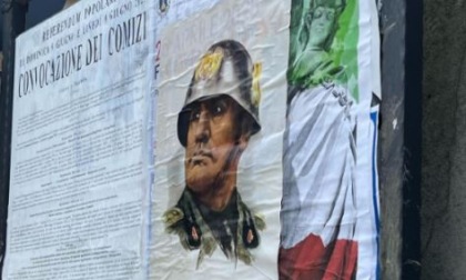 Manifesti raffiguranti Benito Mussolini, la denuncia